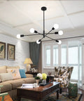 Six Light Black Orbital Style Chandelier For Dining Room And Living Spaces, Dope Mid Century Modern Ceiling Fixture in living room