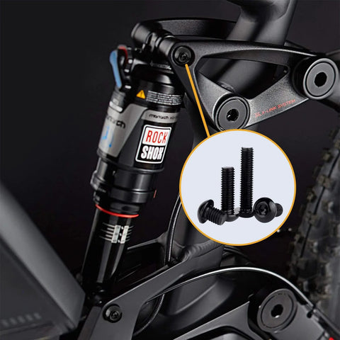 Close-up of a bicycle suspension with inset showing 540 Pcs M3 Screw And Nut Kit With Hex Socket Button Head Cap Screws Nuts And Washers Set Metric Machine Screw Assortment In 10.9 Carbon Steel For DIY Projects And Repairs.