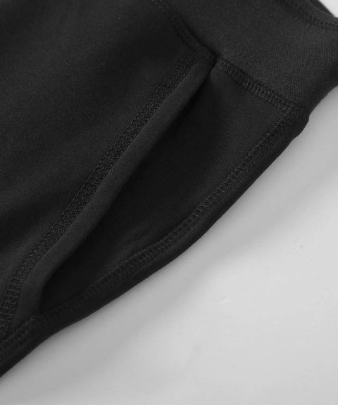 Close-up of black women's cotton sweatpants with pockets, cozy lounge pants with elastic drawstring waist, comfortable for 3X to 4X plus sizes