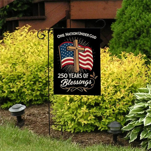 Blessings America Garden Flag 12x18 Burlap with cross and American flag, "One Nation Under God" message in garden setting.