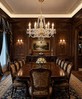 Gold Finish K9 Crystal Chandelier With 6 Lights illuminating an elegant dining room with classic furniture and wood paneling.