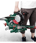 Rock Solid Sliding Miter Saw With Smooth Push Pull Glide And Laser Track On Built Tough Aluminum Base being held with a handy carry handle.