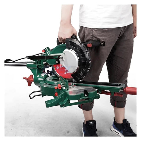 Rock Solid Sliding Miter Saw With Smooth Push Pull Glide And Laser Track On Built Tough Aluminum Base being held with a handy carry handle.
