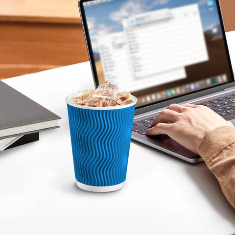 12 Oz Insulated Paper Cups With Ripple Wall For Hot Or Cold Beverages, 50 Count Blue Disposable Cups No Lids on desk with laptop