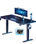 FLEXISPOT E6G CyberX RGB LED Electric Gaming Standing Desk 55 Inch with joystick control and monitor setup.