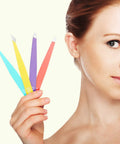 Pro Grade Eyebrow Tweezer Set Four Piece Slant And Pointed Tips Stainless Steel held by woman close to face