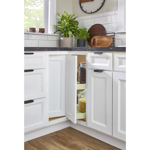 24 Inch Dual Tier Lazy Susan For Corner Kitchen Cabinets with jars in a white cabinet corner, showcasing a clean, organized space.