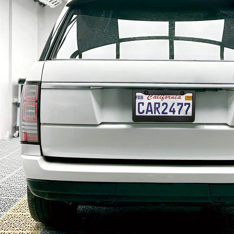 Matte Black License Plate Frame Set For Your Ride, 2 Hole Solid Aluminum Car Plate Holder, attached on white SUV rear
