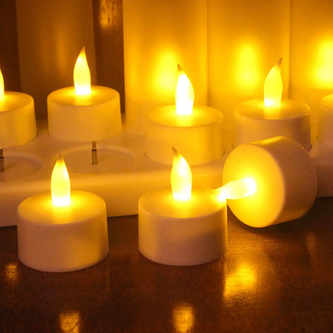 Rechargeable Flameless Tealight Candles Set 12 Pack With White Base And USB Charging Dock flickering LED lights on table