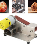 Pro 200W Mini Belt Sander Electric Polishing Grinder With Aluminum Alloy Frame, Micro Knife Sharpener And Diy Bench Sanding Tool For Metal And Wood Projects, Includes 10 Sanding Belts For Reliable Performance on a workbench.