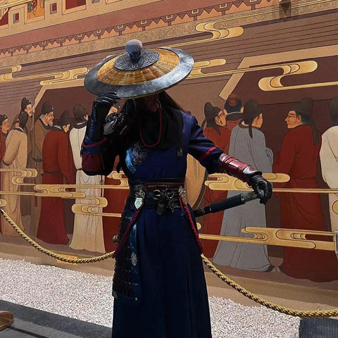 Person in costume with wide-brimmed hat and Katana Sword Belt For Cosplay And Pirate Adventures, All Leather Belt With One To Three Sword Sleeves, 43.3 Inch Length And 1.12 Inch Wide, Black, Rugged And Adjustable Gear For Realistic Look.