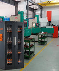 Heavy Duty CNC Tool Cabinet CAT40 Tool Holder Rack With ABS Buffering Liners in a workshop setting with tool holders organized.