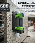 Hella Heavy Duty Electric Suction Lifter For Glass, Granite & Tile displaying 600lbs holding power on a stone surface.