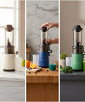 Super Sleek Silver Gray Cold Press Masticating Juicer With Extra Wide Feed Opening For Whole Fruits And Easy Electric Home Use High Efficiency Extraction Machine Stylish Modern Design in three color variations.