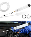 Grease Monkey Ready Manual Fluid Extractor Pump With Three Extension Hoses For Brake Fluid Swap And Gear Oil Transfer Solid Rubber Seal Blocks Leaks Keeps Your Shop Clean, shown in use with hoses.