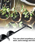 Image of Heavy Duty Garden Auger Drill Bit 5.9 Inch by 33 Inch handheld post hole digger with plants and non-slip handle.
