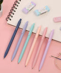 All-In-One Student Stationery Kit With Pencil Case, 12 Pastel Highlighters, 5 Black Gel Pens, Mechanical Pencils, Sticky Note Pad, Erasers, And More Pink School Supplies Set For College And Back To School with pastel pens and erasers on pink background
