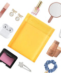 Yellow Kraft Bubble Mailers 3.5x5 Inch Inner, 3.5x6.7 Inch Outer Self Sealing Padded Envelopes with cosmetics and jewelry items