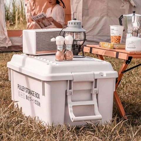 Heavy Duty Rolling Bin With Secure Lid And Easy Roll Casters, stackable outdoor camp organizer in use at a campsite.