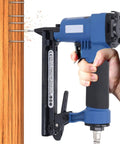 Rock Solid 22 Gauge Pneumatic Air Brad Nailer in use, showcasing ergonomic handle and split body design for woodworking tasks.