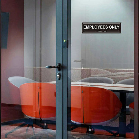 Four Pack Self Adhesive Employees Only Sign For Doors in office meeting room, black 7x2 inch, on glass door with orange chairs