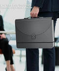 Grab And Go Expandable Accordion File Folder Boasting 25 Roomy Pockets A Heavy Duty Plastic Carry Handle held by a professional.