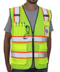 High Visibility Work Safety Vest ANSI Class 2 Yellow Mesh With Pockets And Zipper Padded Neck For All Day Comfort Durable Construction Reflective Yellow Orange Trim Pro Grade For Construction Road Crew And Outdoor Labor worn by a person
