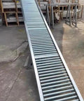 Top Notch Stainless Steel Gravity Roller Conveyor 20 Inch Wide three feet long sloped rack for warehouse use.