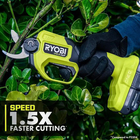 Knock Out Overgrown Branches Like A Pro 18V Brushless Cordless Pruner cutting through branches with razor sharp blades in green foliage.