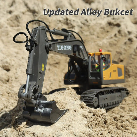 Boss 11 Channel RC Excavator Toy With 680 Degree Rotation And Alloy Bucket in sand, outdoor play for kids ages four to ten