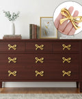 Six Pcs Gold Bow Knobs Set With Screws, Vintage Brass Drawer Handles For Cabinets And Dressers, Cupboards, Antique Gold Finish on dresser