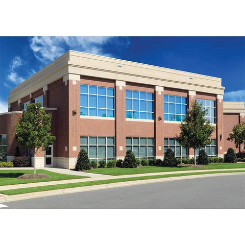 Crosstour 26W Carbon Outdoor Integrated LED Wall Pack With 4000K Neutral White, Bronze Finish on modern building exterior