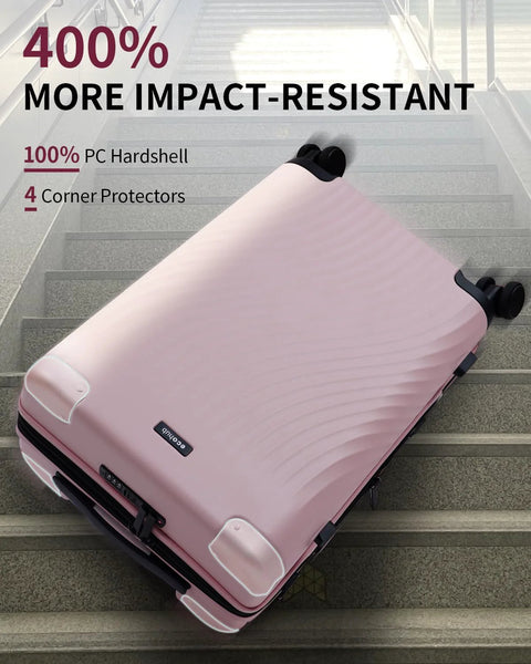 Pink recycled polycarbonate carry-on luggage by ECOHUB, impact-resistant design with four corner protectors, resting on stairs.
