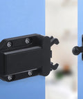 Close-up of Push To Open Cabinet Latch With Touch Release, No-Handle Push Lock for wardrobes in black finish on blue door.