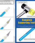 Close-up of tools from 55 Piece Hollow Punch Cutter Kit With 52 Shape Options, featuring a rubber hammer and carving knife with replacement blades.