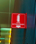 Side view of Fire Extinguisher Sign With Down Arrow, 6x6 Acrylic Safety Labels, mounted on wall, UV protected ink, waterproof, no fade
