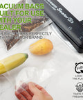 Single-Ply Vacuum Sealer Bags 6x10 Inch Quart Size Pro Grade showing banana and mango inside bag, demonstrating storage use
