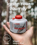 Hand holding Isobutane Camping Fuel Canisters 100g Each, Ultra Portable Gas for Camp Stoves and Lanterns in forest