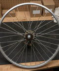 Slick Single Speed Rear Wheel Rim With Heavy Duty Aluminum Hub And Plug In Brake Assembly For No Sweat Bike Repair and Rock Solid Stopping Power Built To Roll All Week Long, 26 inch silver rim.