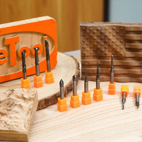 All-In-One 10 Piece TAC Coated CNC Router Bit Set Pro-Grade With One Quarter Inch Shank For Woodworking And Sign Making includes various bit sizes displayed with wood samples