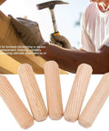 Wooden Dowel Pins Set 500 Pcs Assortment Fluted Beveled Hardwood Dowels and carpenter working in the background