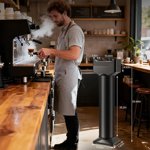 Vertical Electric Espresso Portafilter Cleaner With Knock Box Combo Auto Ground Removal For Home And Cafe Baristas Smooth Daily Grind Cleanup Universal Fit Quick Dump Station showcased in cafe with barista.