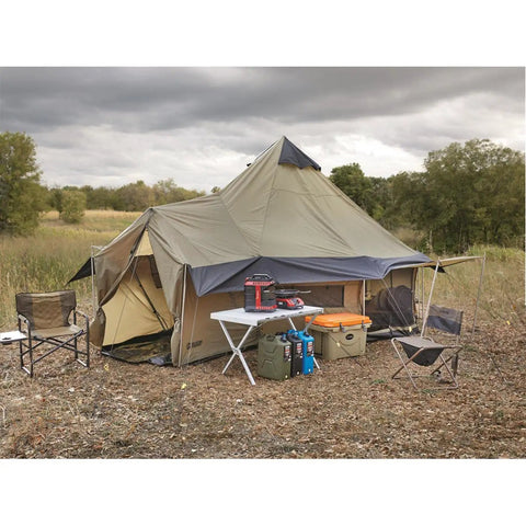 Base Camp Tent For All Weather Adventures With Stove Jack Four Season Camping For Hiking And Hunting Ultra Spacious 14 Ft Diameter Shelter With 10 Ft Center Height For Standing Room And Your Camp Crew in field setting.