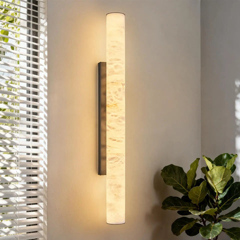 Natural Alabaster Wall Sconces Set Of Two Cylinder LED Wall Lights With Matte Black Metal Base Modern smooth glow mounted on wall.