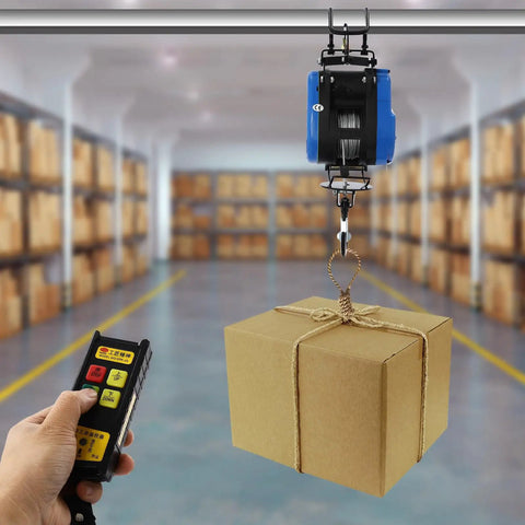 Heavy Duty Electric Chain Hoist, 1100 Lb Capacity With 1800 Watt Motor lifting a box with dual remote control in a storage area.