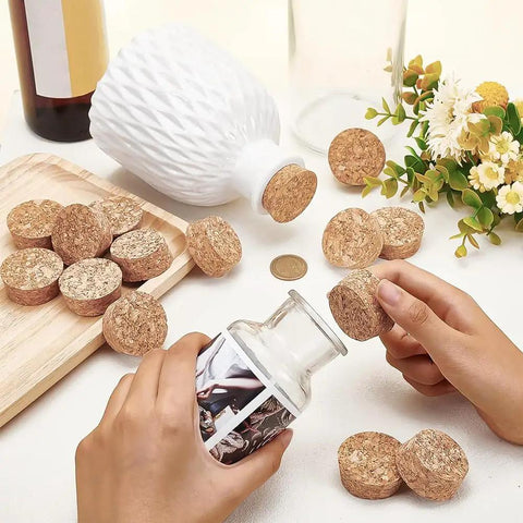 Hands placing Conical Cork Bottle Stoppers Set For Wine And Beer 30 Pcs Wooden Plugs 1.7 Inch Diameter into bottle, BurlyWood finish