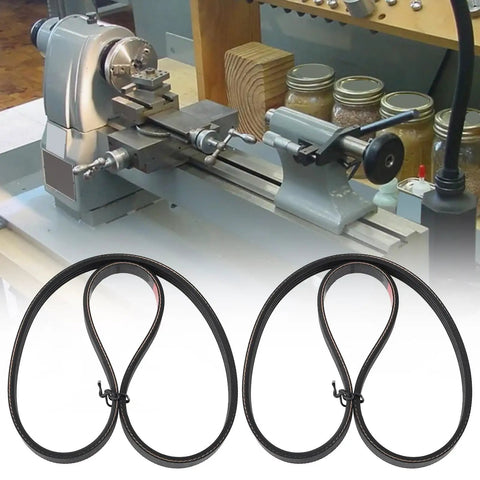 Two Lathe Drive Belt Replacement Belts For Mini Wood Lathe 65345 with 24 Inch Internal Length in front of a lathe machine