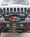 Red D-ring shackles mounted on a Jeep bumper, part of the Heavy Duty Three Quarters Inch D Ring Shackle 70,000 Lb Break Strength Kit