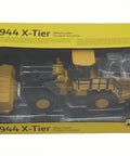 Boxed 944 X Tier Wheel Loader Toy In Prestige Collection 1 To 50 Scale with clear cab, realistic detailing, LP82821 visible.