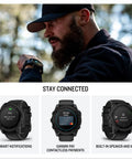 Man using 51mm Solar-Powered Tactical GPS Smartwatch With Titanium Bezel And Sapphire Lens, 40M Dive Rating, outdoor setting